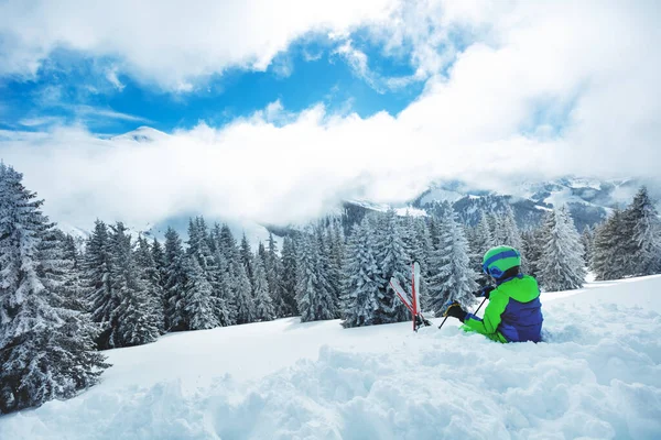 Skier Boy Sit Snow Mountains Snowy Fir Forest Heavy Snowfall — Stockfoto