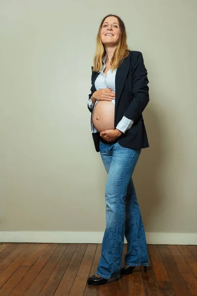 Portrait Pregnant Woman Wearing Suit Showing Big Belly Business Concept — Foto Stock
