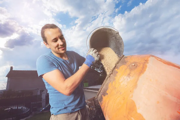 Man Pour Out Bucket Sand Cement Mixer Doing Diy Work — Stock Photo, Image