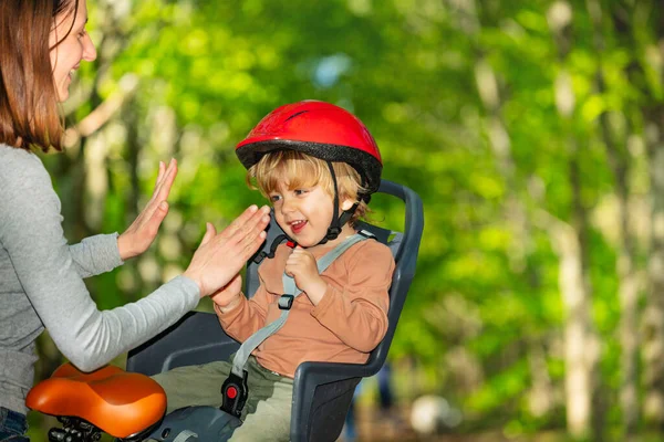 Close Portrait Little Blond Boy Bicycle Seat Red Helmet Park — Foto Stock