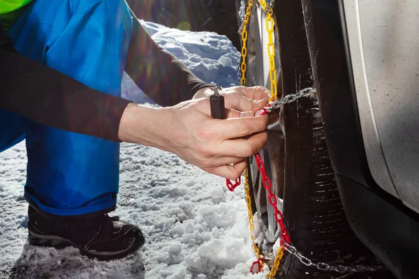 Man Hands Close Putting Chains Car Wheel Icy Road Winter — 图库照片