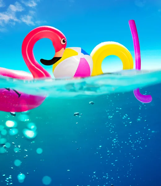 Pool Text Made Inflatable Flamingo Balls Rings Rubber Buoys Sea — 图库照片