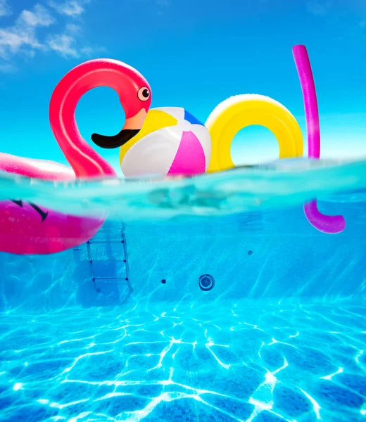 Pool Text Made Inflatable Flamingo Balls Rings Rubber Buoys Underwater — 图库照片