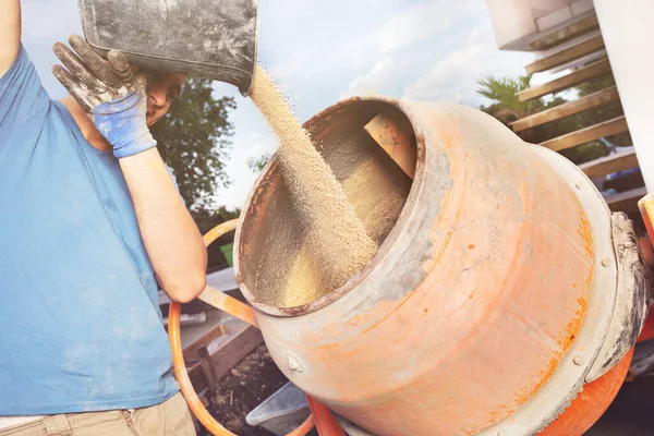 Man Adds Sand Bucket Cement Mixer Doing Diy Work Home — Stock Photo, Image