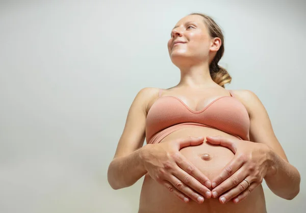 Smiling Pregnant Woman Hold Hands Heart Shape Holding Belly — Stock Photo, Image