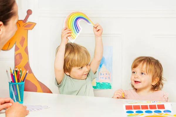 Two Kids Boy Little Girl Point Rainbow Card Sitting Development —  Fotos de Stock