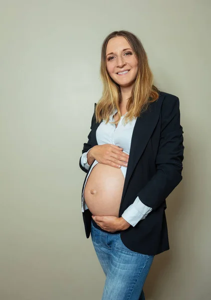 Portrait Smiling Pregnant Woman Wearing Suit Showing Big Belly Working — Foto Stock