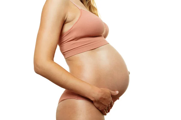 Profiel Van Een Zwangere Vrouw Buik Casual Ondergoed Witte Achtergrond — Stockfoto