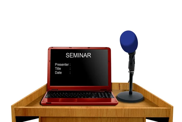 Microphone and laptop on podium at seminar — Stock Photo, Image