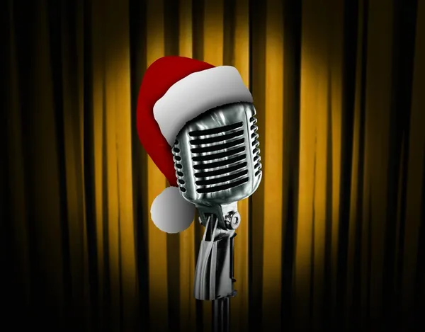 Retro microphone with Santa hat — Stock Photo, Image