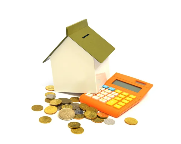 House, calculator and coins, buying property concept — Stock Photo, Image