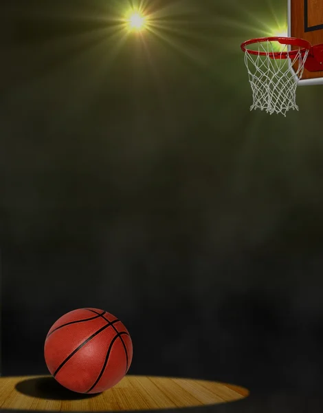 Basketball on the Floor and Hoop under Spotlights — Stock Photo, Image