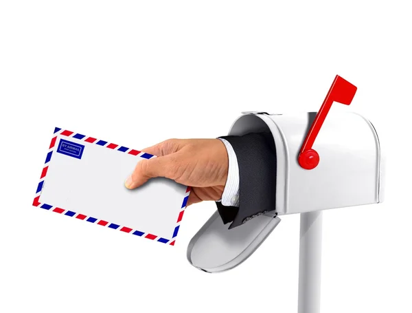Caixa de correio e uma mão com um envelope — Fotografia de Stock