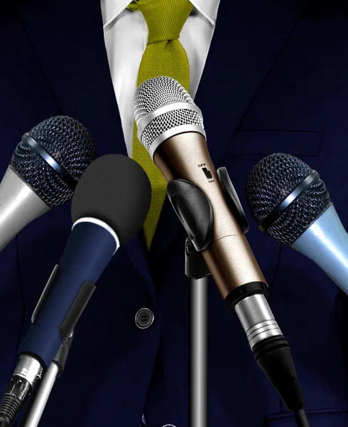 Man Giving Speech Using Microphones — Stock Photo, Image