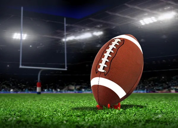 Football Ball On Grass under Spotlights — Stock Photo, Image