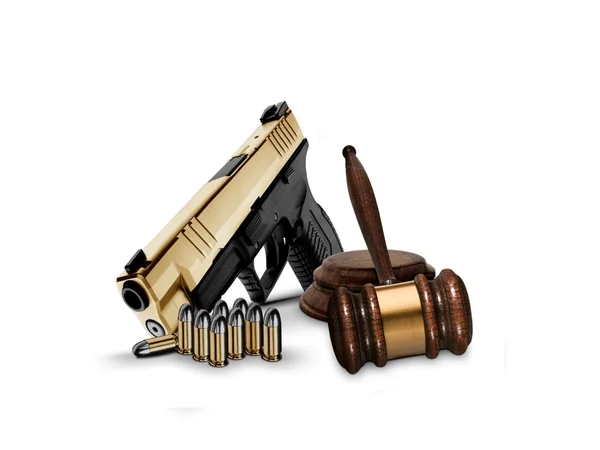 Młotek i rękę pistolet z kul — Zdjęcie stockowe