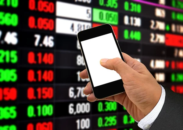 Hand Holding Smart Phone and Stock Data — Stock Photo, Image