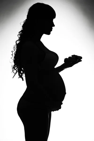 Silueta de mujer embarazada —  Fotos de Stock
