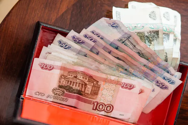Basket of money — Stock Photo, Image