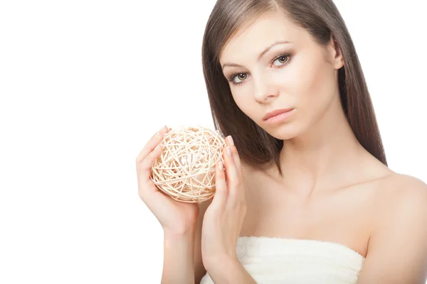 Woman holding wooden ball — Stock Photo, Image
