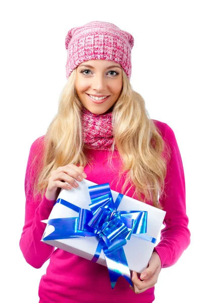 Woman wearing knitwear holding giftbox — Stok fotoğraf