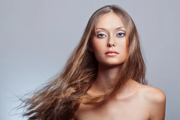 Woman face portrait with flying hair — Stock Photo, Image