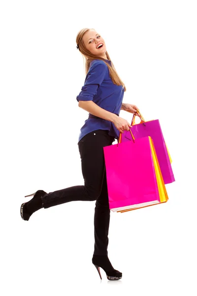 Žena nesoucí nákupní tašky — Stock fotografie