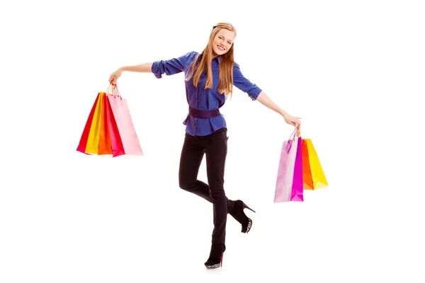 Mulher carregando sacos de compras — Fotografia de Stock