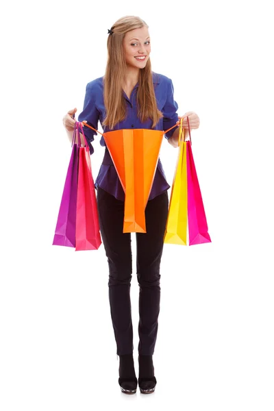 Woman standing with opened shopping bag — Stock Photo, Image