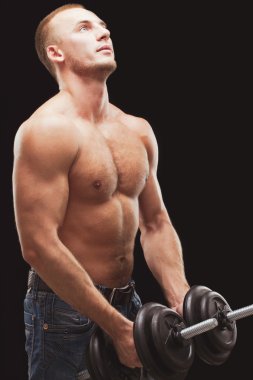 adam excersizing dumbbells ile