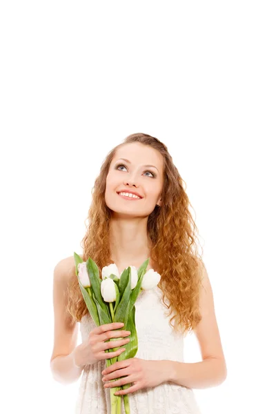 Mulher feliz segurando tulipas — Fotografia de Stock