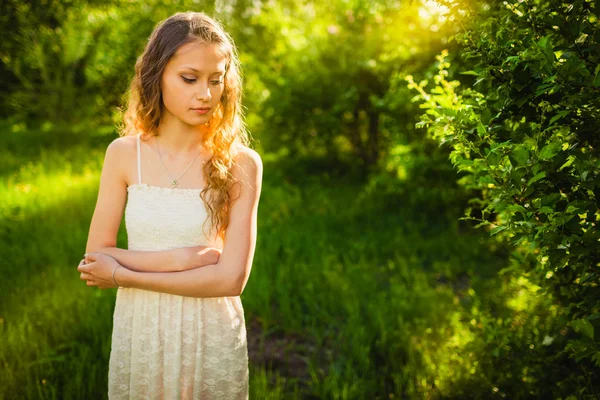 Woman in the summer park — Stock Photo, Image