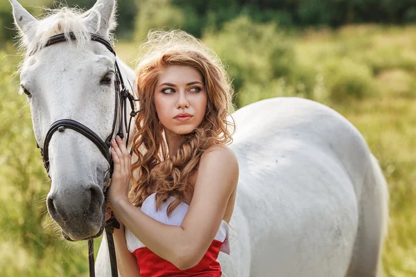 Beautiful sensual women with white horse — Stock Photo, Image