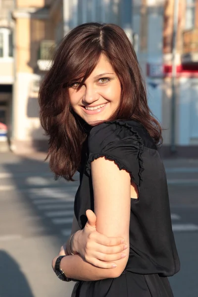 Portrait of a young woman in the sunset — Stock Photo, Image