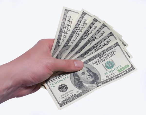 Money dollars in a hand isolated white background — Stock Photo, Image