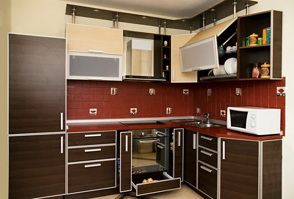 Interior of modern kitchen in dark tones Stock Picture