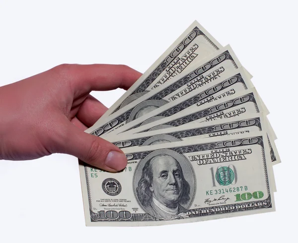 Pengar dollar i hand isolerade vit bakgrund Stockbild