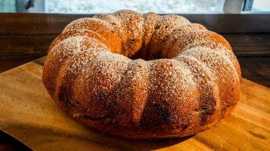 Home made pudding cake with isolated on black background
