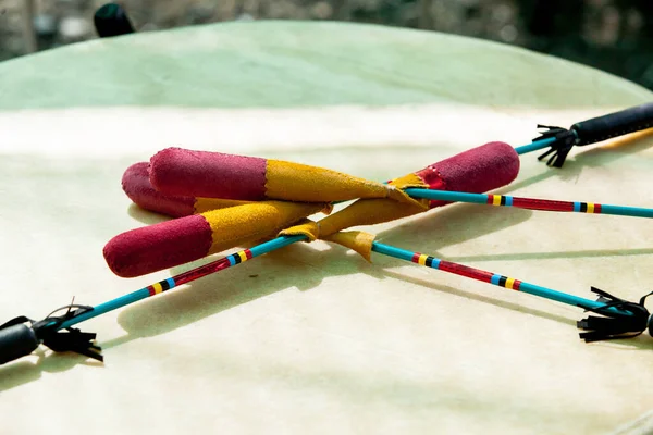 Drummer stick on native american event close up