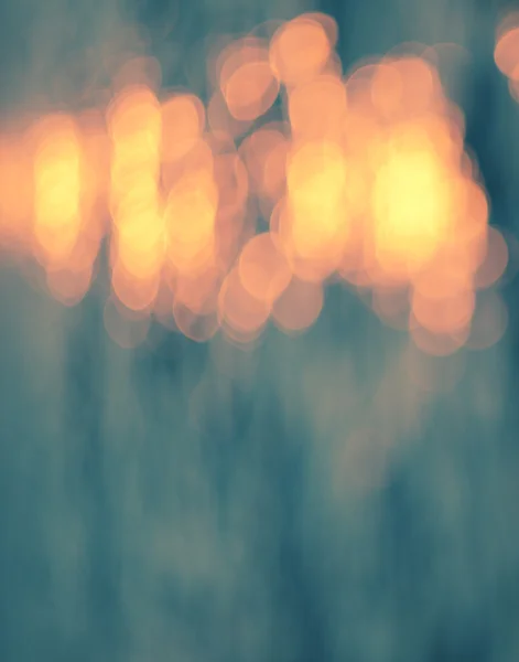 Luces solares sobre fondo de agua azul . — Foto de Stock