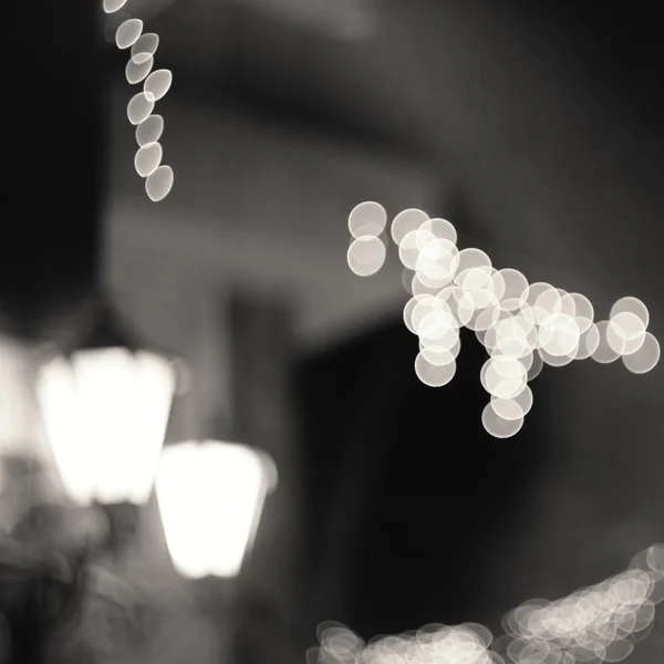 Bokeh background.festive lampor i gatan. — Stockfoto