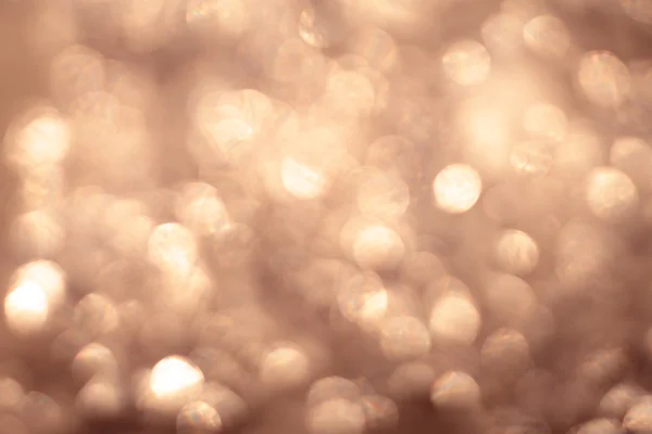 Gyllene ljus bokeh bakgrund. — Stockfoto