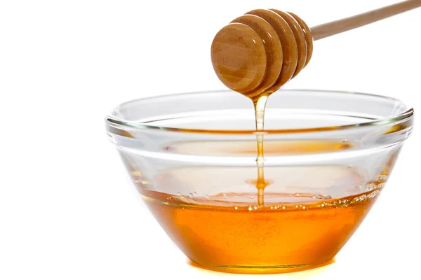 Miel con cazo y tazón de vidrio —  Fotos de Stock