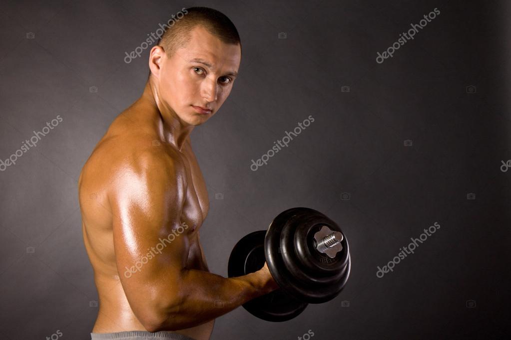 Muscled Male Bodybuilder Dumbbell Swing Stock Photo C A