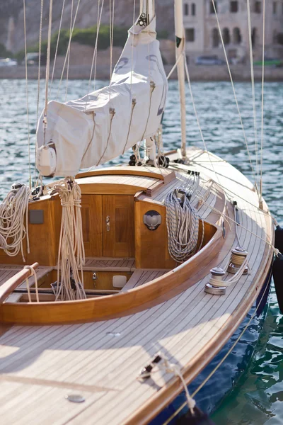 Beautiful wooden sailboat on blue sea ocean Royalty Free Stock Images