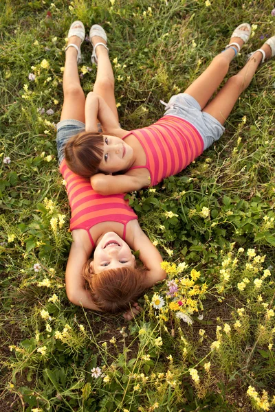 Portrait of little girls outdoors in summer — Stock Photo, Image