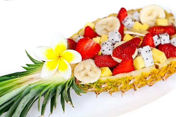 Fruit salad in pineapple. breakfast surprise — Stock Photo, Image