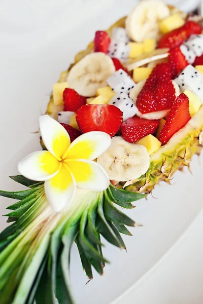 Fruit salad in pineapple. breakfast surprise — Stock Photo, Image