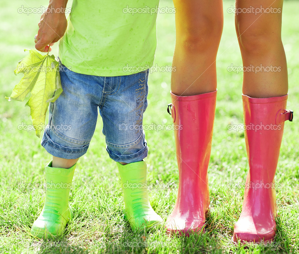 pink and green rain boots