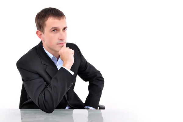 Un joven hombre de negocios pensando — Foto de Stock